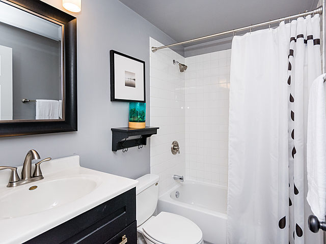 2127 West Rice Street, Unit 4E Chicago, IL 60622 - Photo 17 of 23 a bathroom with a sink toilet and shower