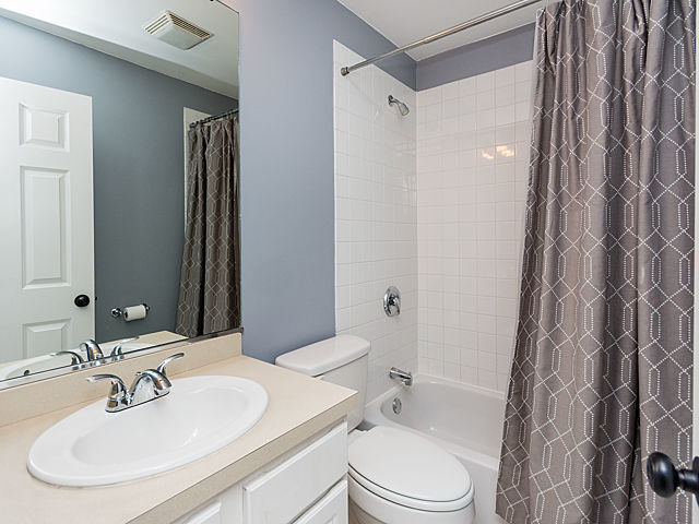 2127 West Rice Street, Unit 4E Chicago, IL 60622 - Photo 18 of 23 a bathroom with a sink toilet and shower