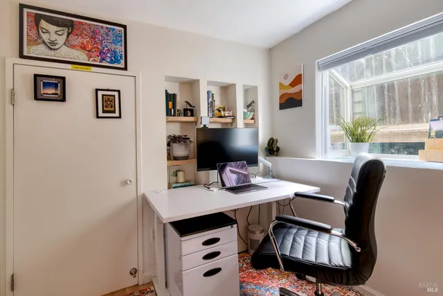 a room with furniture and a window