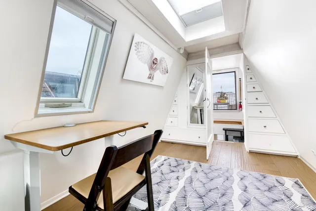 a backyard of a house with seating space