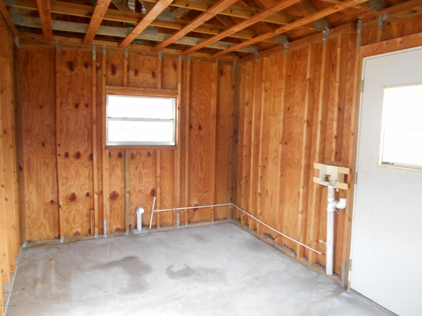 711 Airoso Road Southeast Palm Bay, FL 32909 - Photo 14 of 39 Workshop Interior