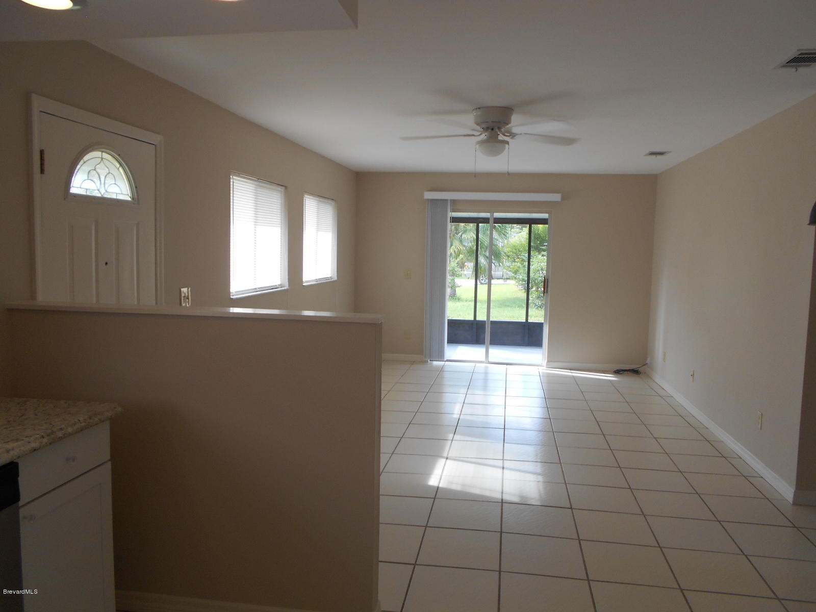 711 Airoso Road Southeast Palm Bay, FL 32909 - Photo 22 of 39 Kitchen to Living Room