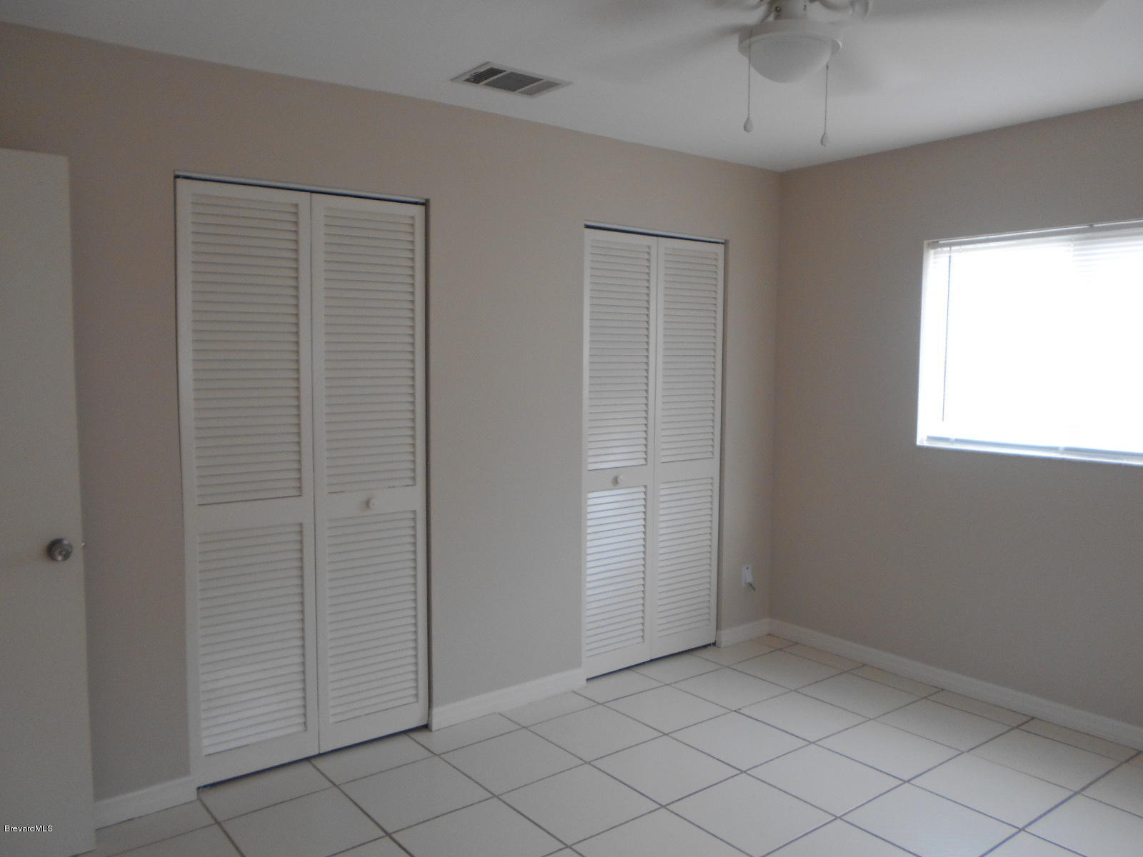 711 Airoso Road Southeast Palm Bay, FL 32909 - Photo 26 of 39 Bedroom 1