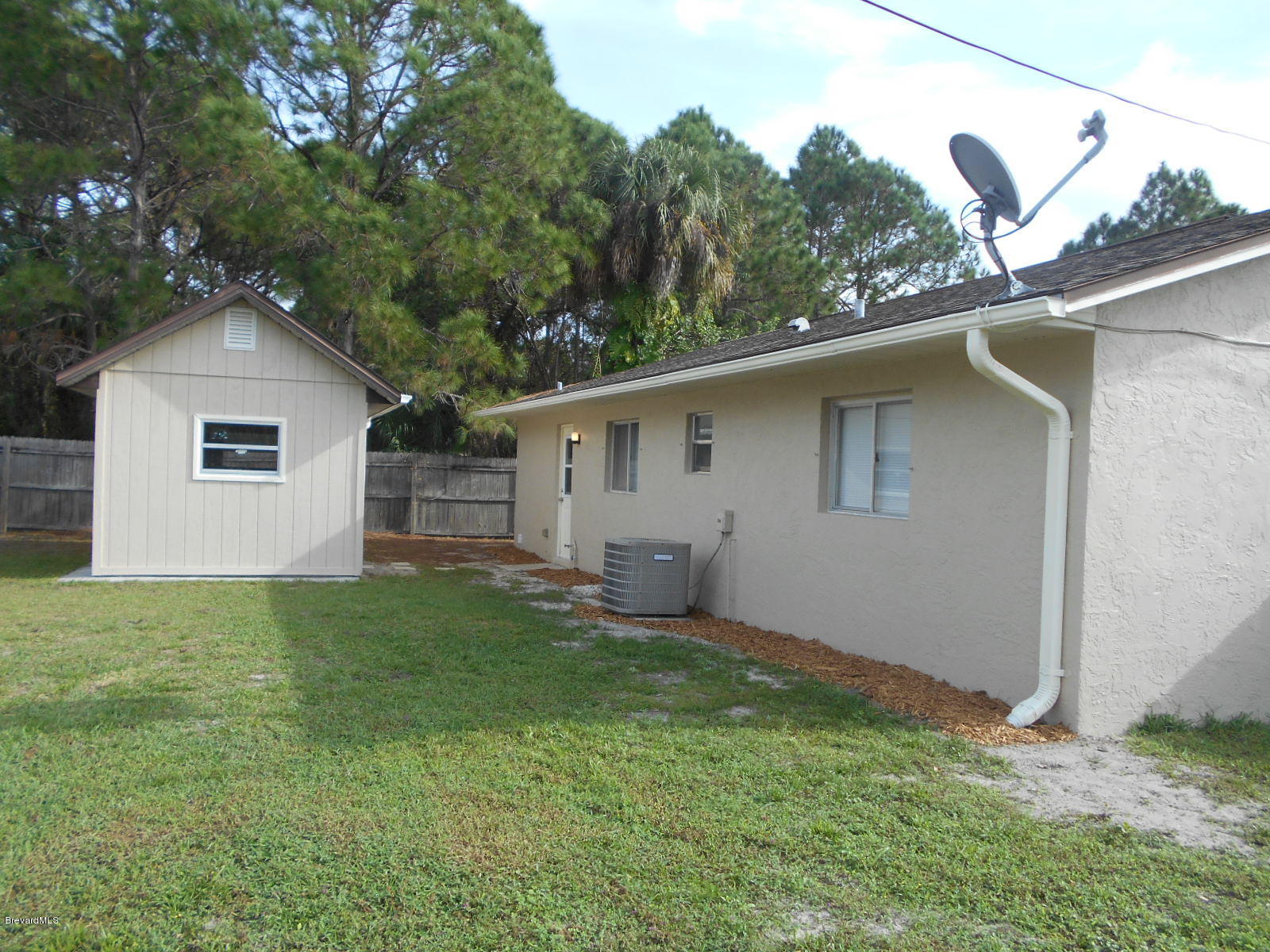 711 Airoso Road Southeast Palm Bay, FL 32909 - Photo 5 of 39 Back View