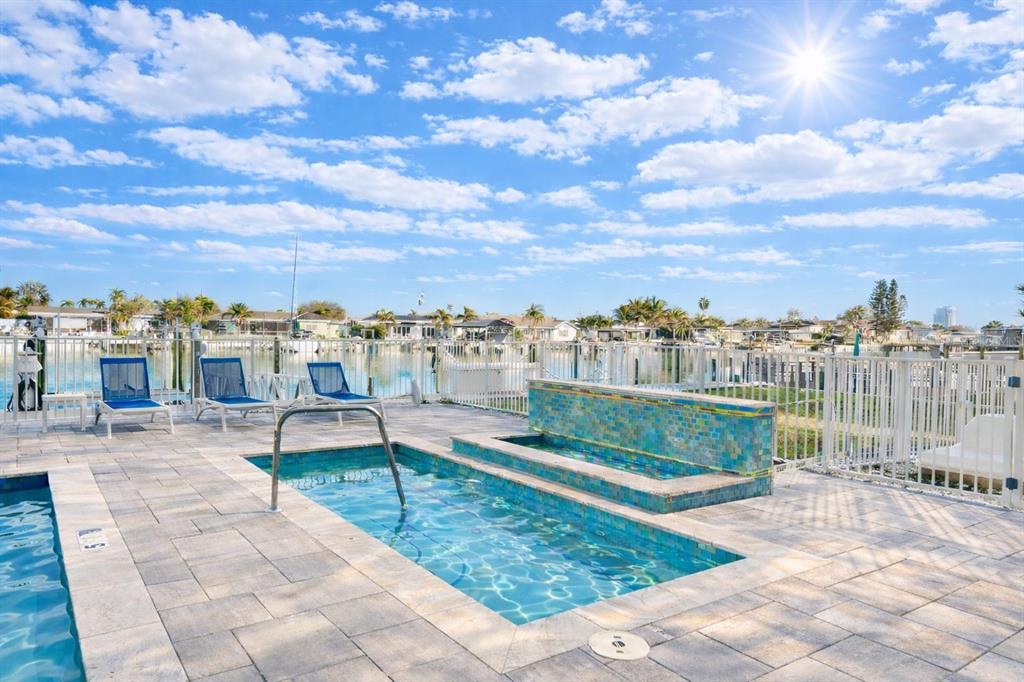 415 Island Way, Unit 402 Clearwater Beach, FL 33767 - Photo 31 of 35 a view of a city from a terrace