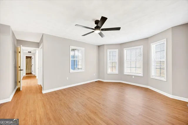 a bathroom with a sink vanity and a mirror