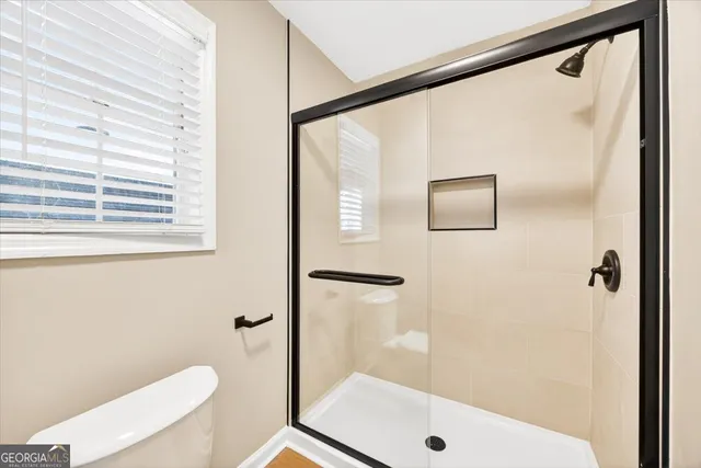 a bathroom with a sink a mirror and a vanity