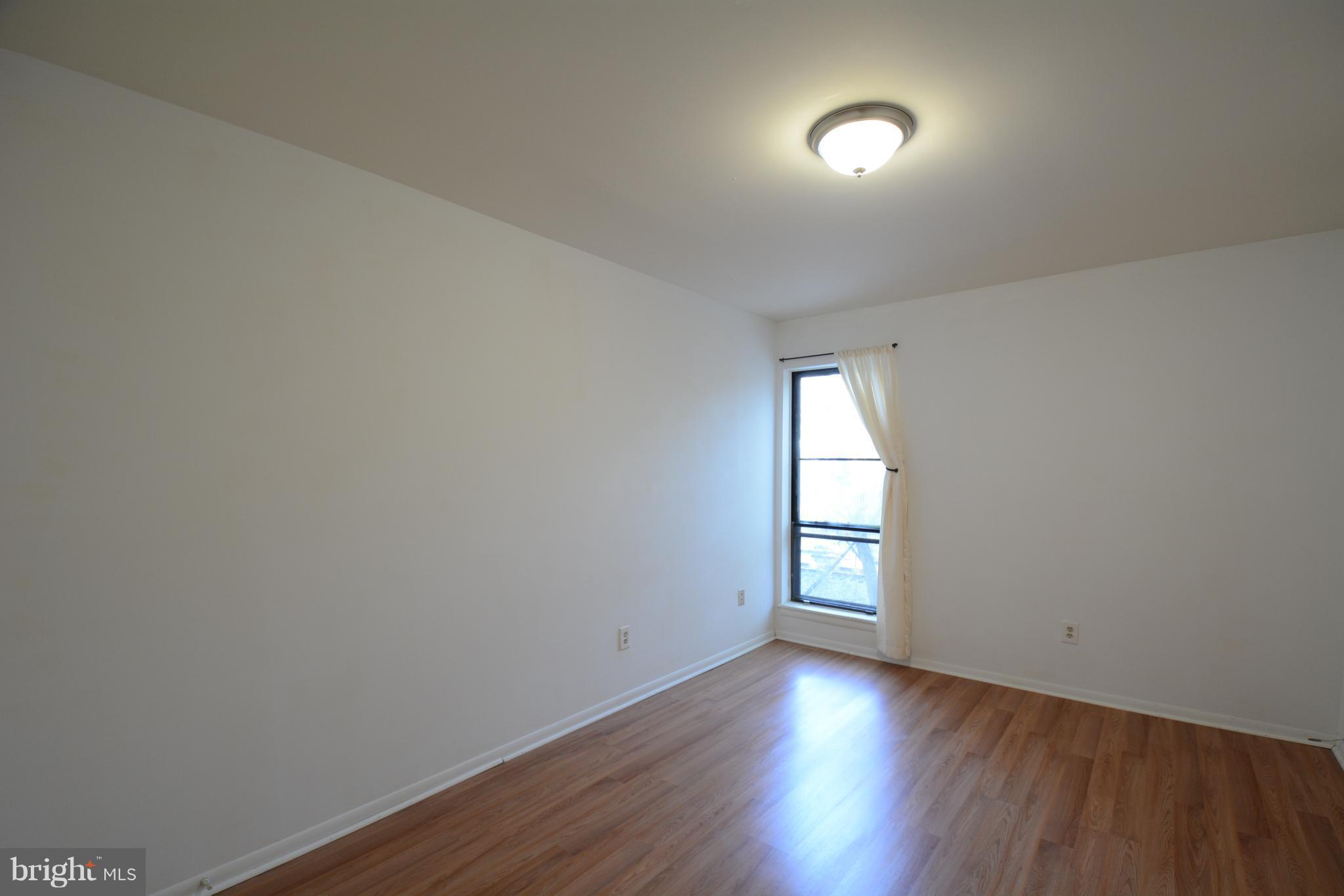 5812 Royal Ridge Drive, Unit O Springfield, VA 22152 - Photo 14 of 19 Master bedroom to back of condo