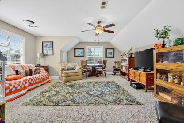 a view of a dining room with furniture