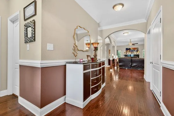 a kitchen with stainless steel appliances a stove and cabinets
