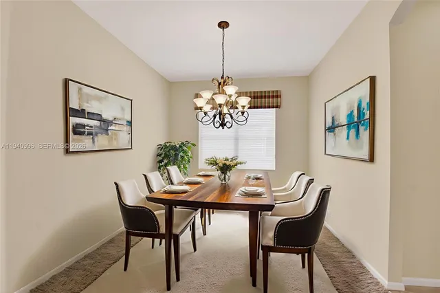 a bathroom with a shower sink vanity and toilet