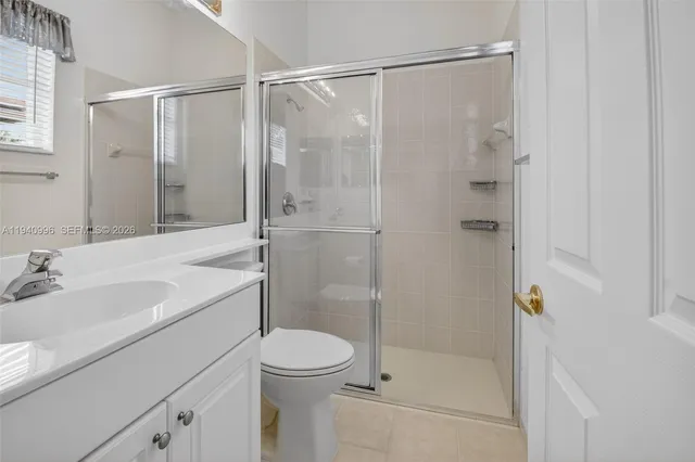 a view of a swimming pool with outdoor seating