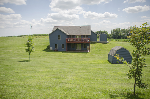 13688 Damen Road Morrison, IL 61270 - Photo 3 of 24 a view of a house with a swimming pool