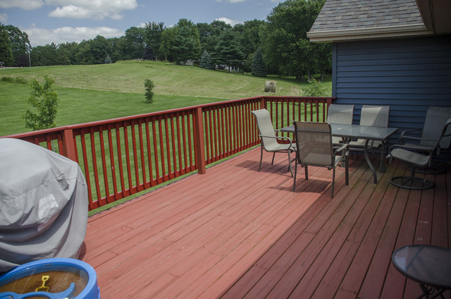 13688 Damen Road Morrison, IL 61270 - Photo 8 of 24 a view of a wooden deck with furniture