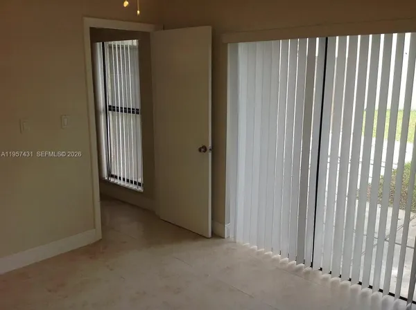 an empty room with windows