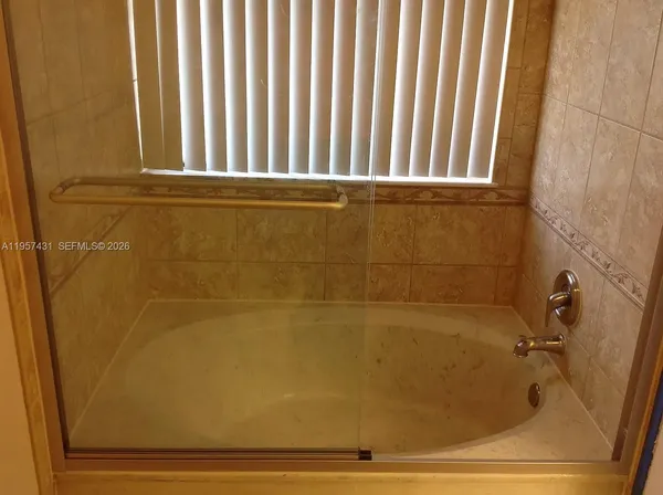 a bathroom with a bathtub