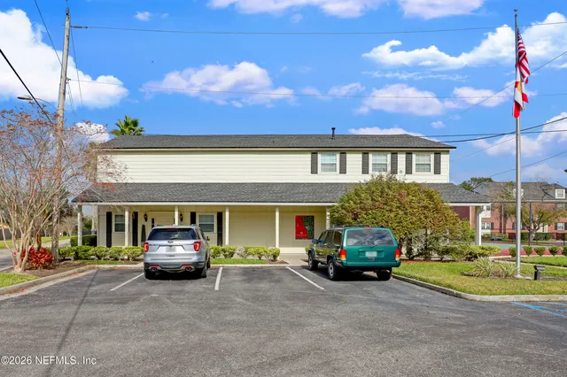 a car parked in front of a house