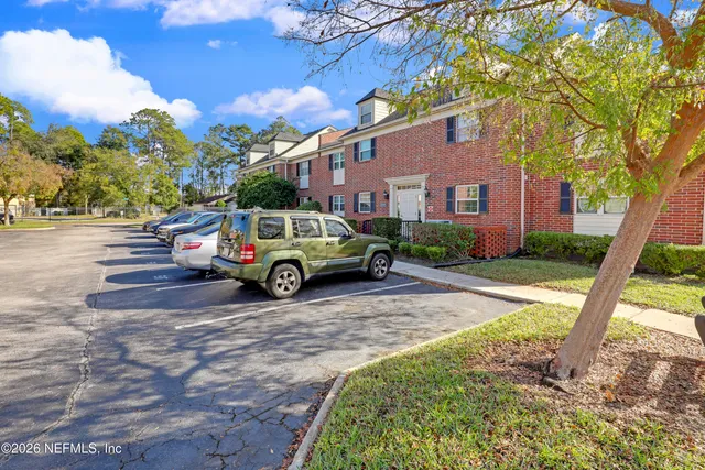 a car parked in front of a house