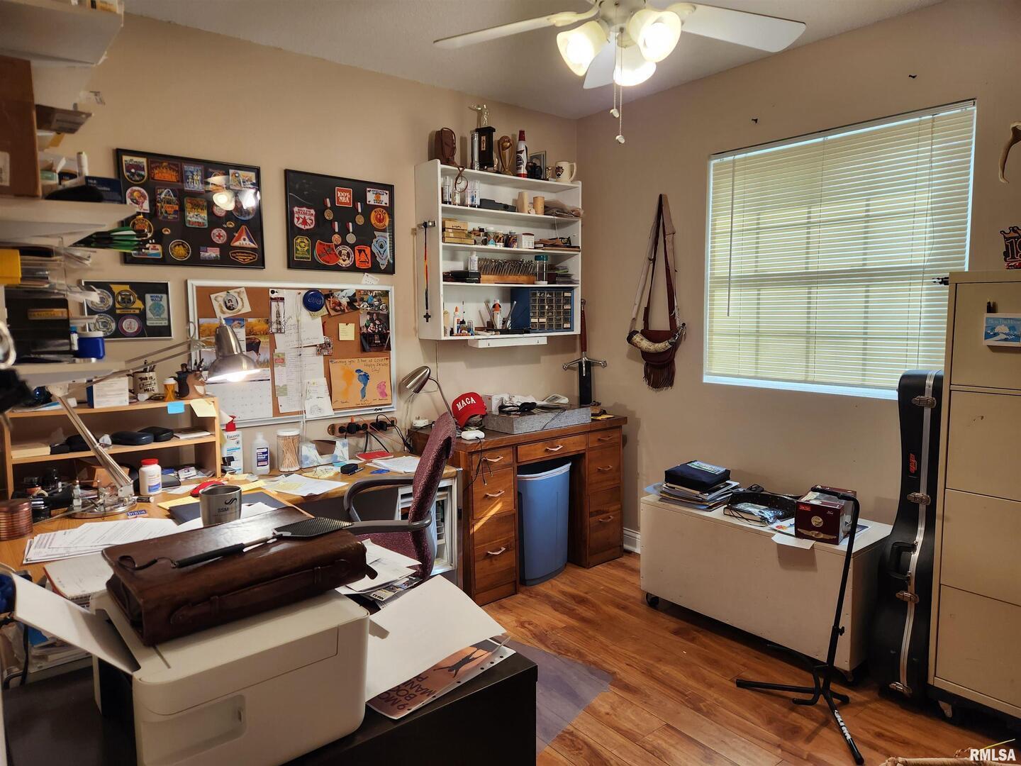 15766 East Tilton Road Ina, IL 62846 - Photo 31 of 59 a view of a workspace with furniture and toys