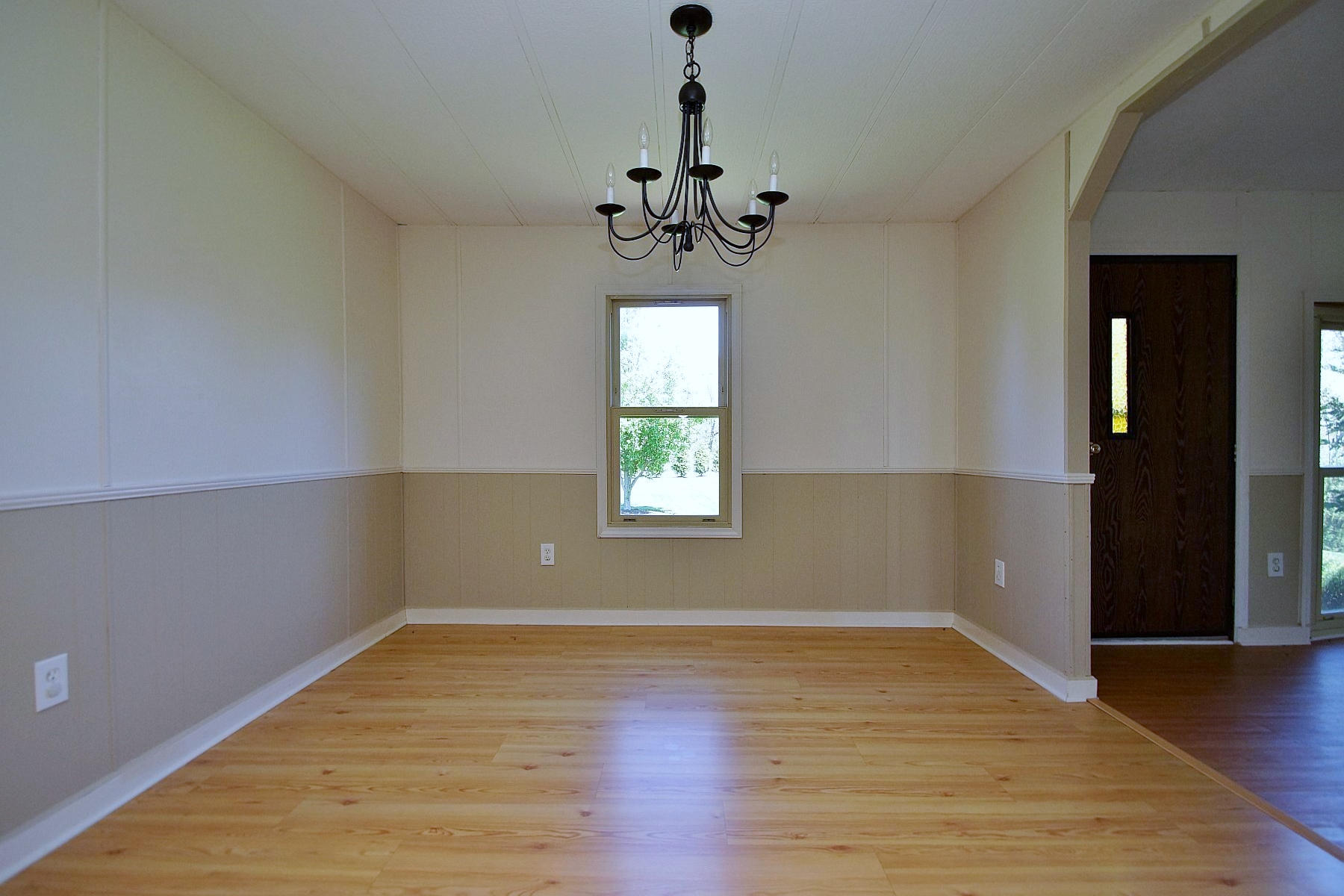 164 Tabernacle Road Penhook, VA 24137 - Photo 16 of 46 wooden floor in an empty room with a window