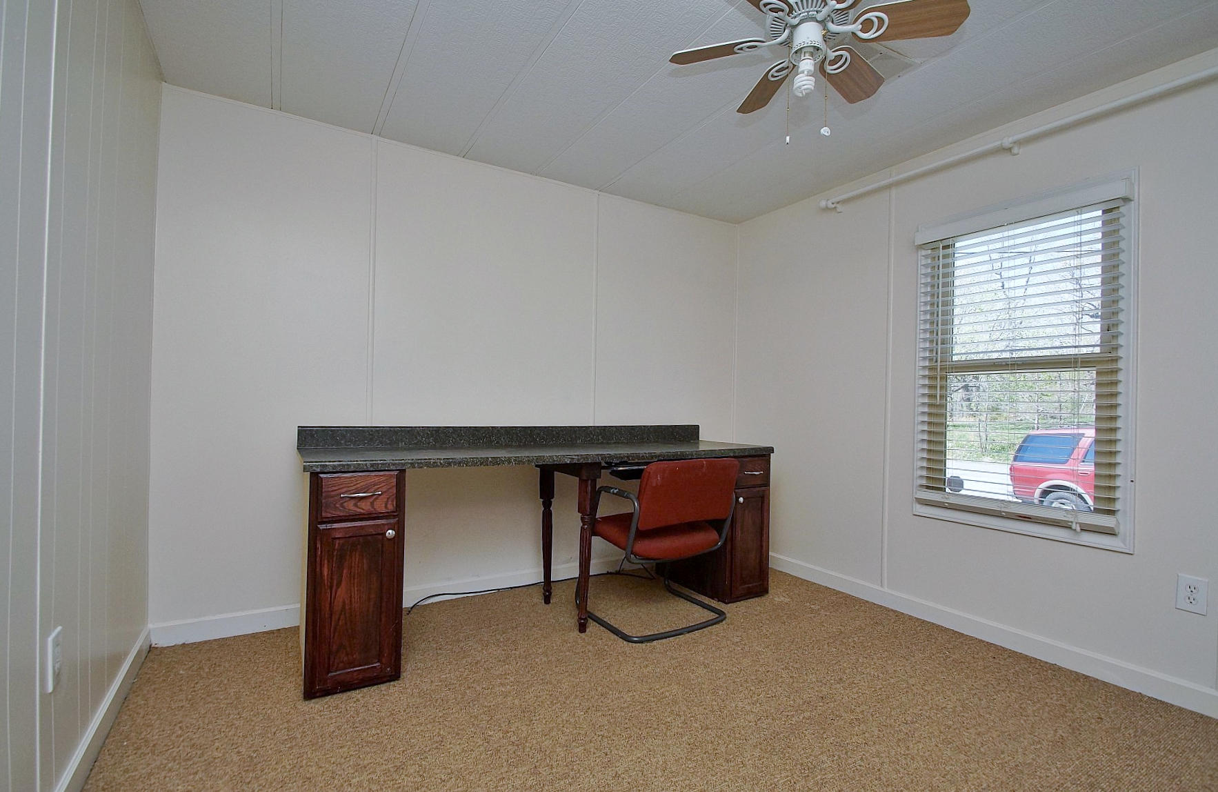 164 Tabernacle Road Penhook, VA 24137 - Photo 26 of 46 a living room with furniture and a window