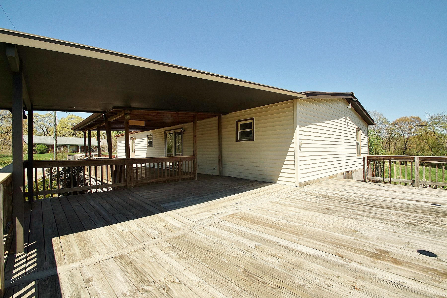 164 Tabernacle Road Penhook, VA 24137 - Photo 31 of 46 a bedroom with a bed and a large window