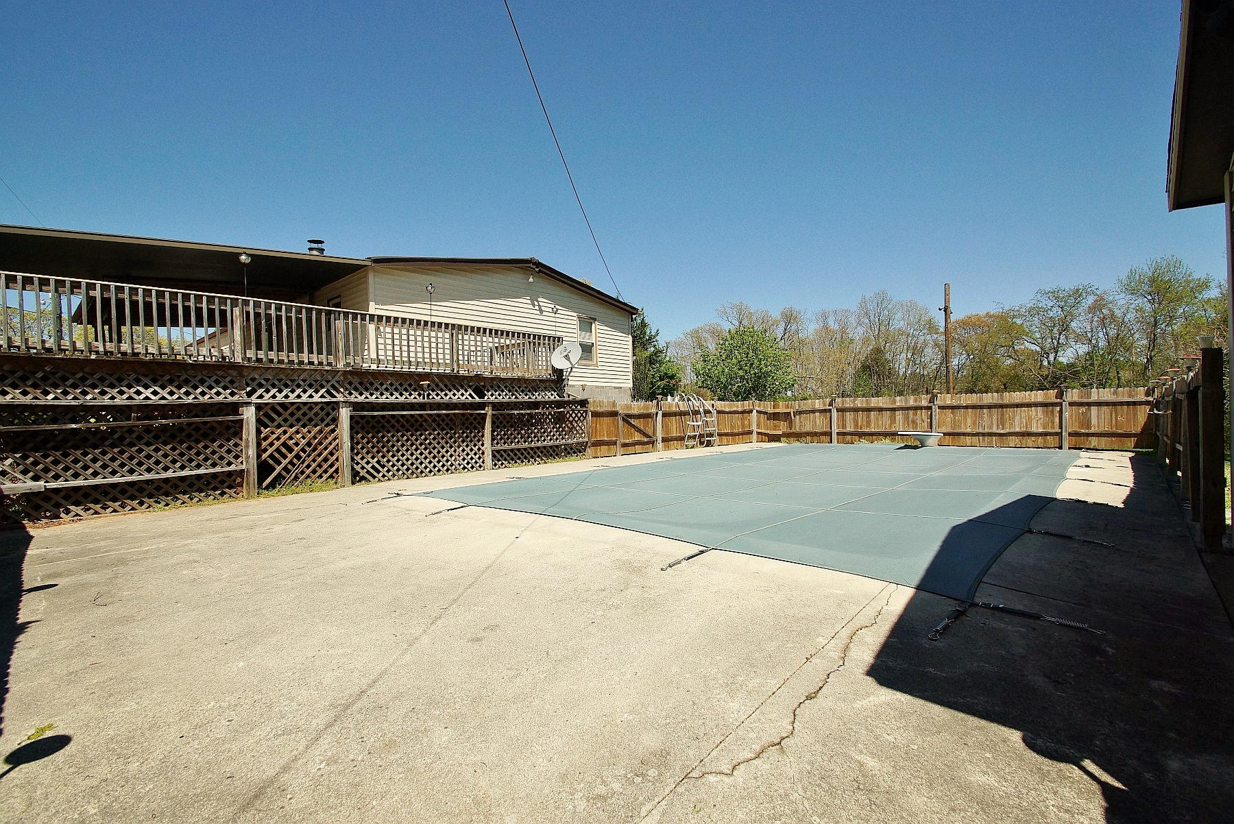 164 Tabernacle Road Penhook, VA 24137 - Photo 34 of 46 a view of a swimming pool with an outdoor space and seating area
