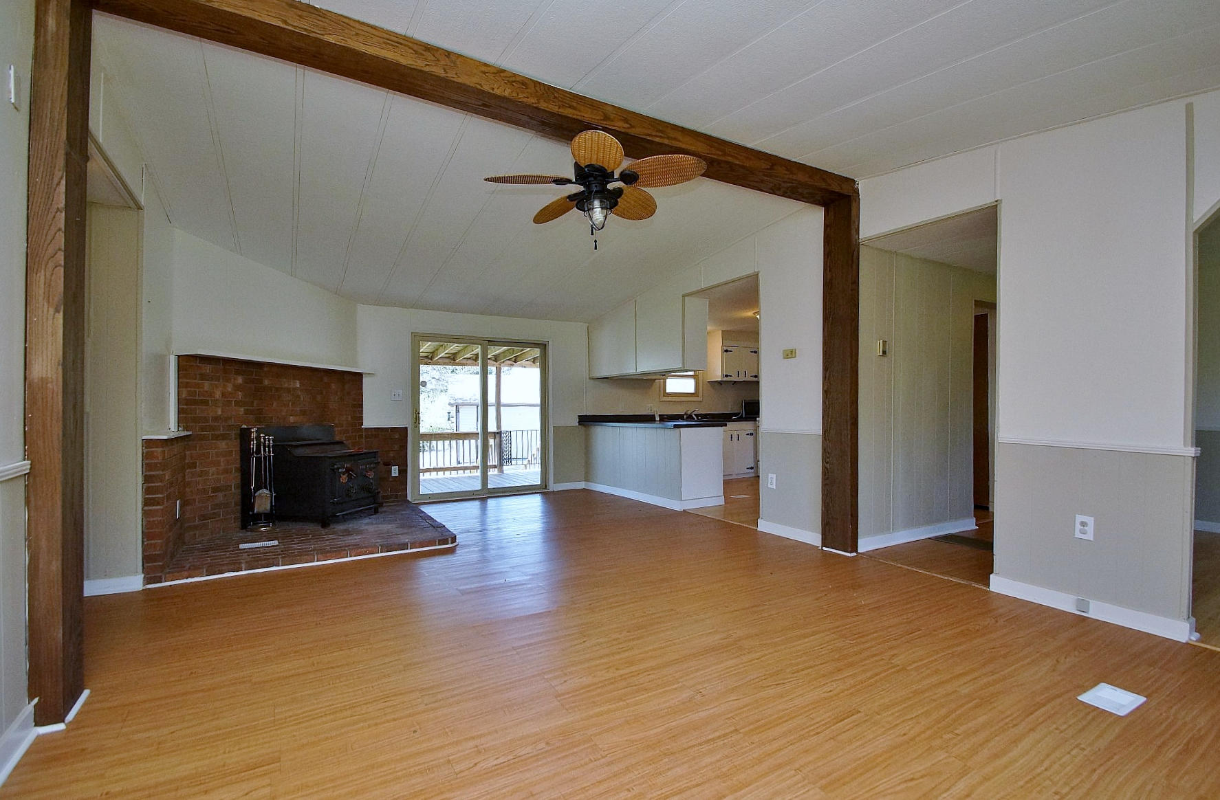 164 Tabernacle Road Penhook, VA 24137 - Photo 8 of 46 wooden floor in an empty room with a fireplace