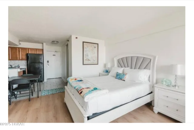 a kitchen with a refrigerator stove and a sink