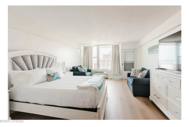 a bedroom with furniture and a couch