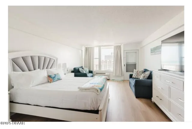 a kitchen with a refrigerator stove and sink