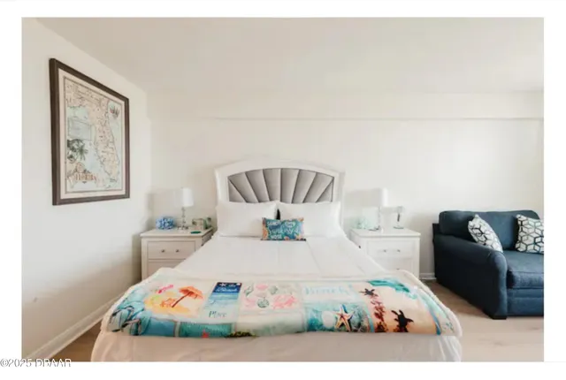 a living room with furniture fireplace and flat screen tv