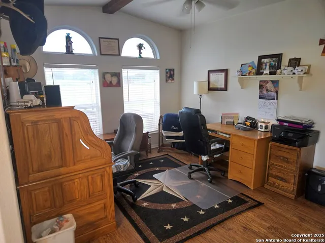 a view of workspace with windows gym equipment and windows