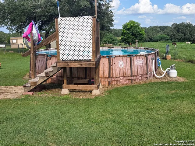 a garden view with a sitting space