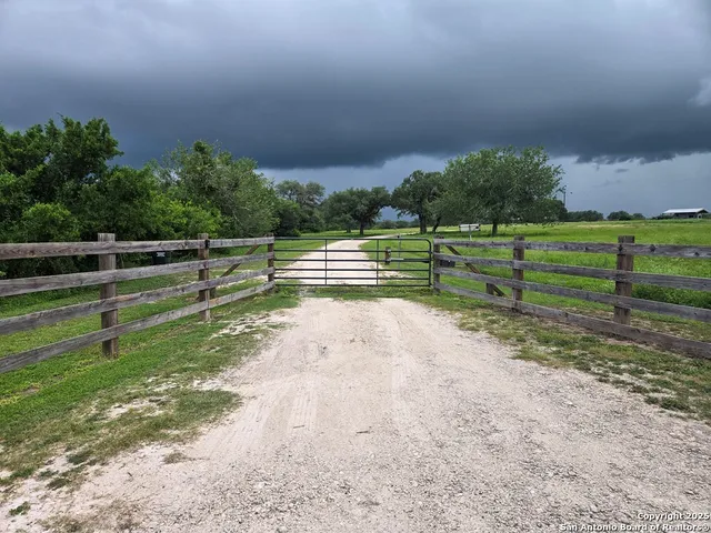 a view of a balcony with chairs