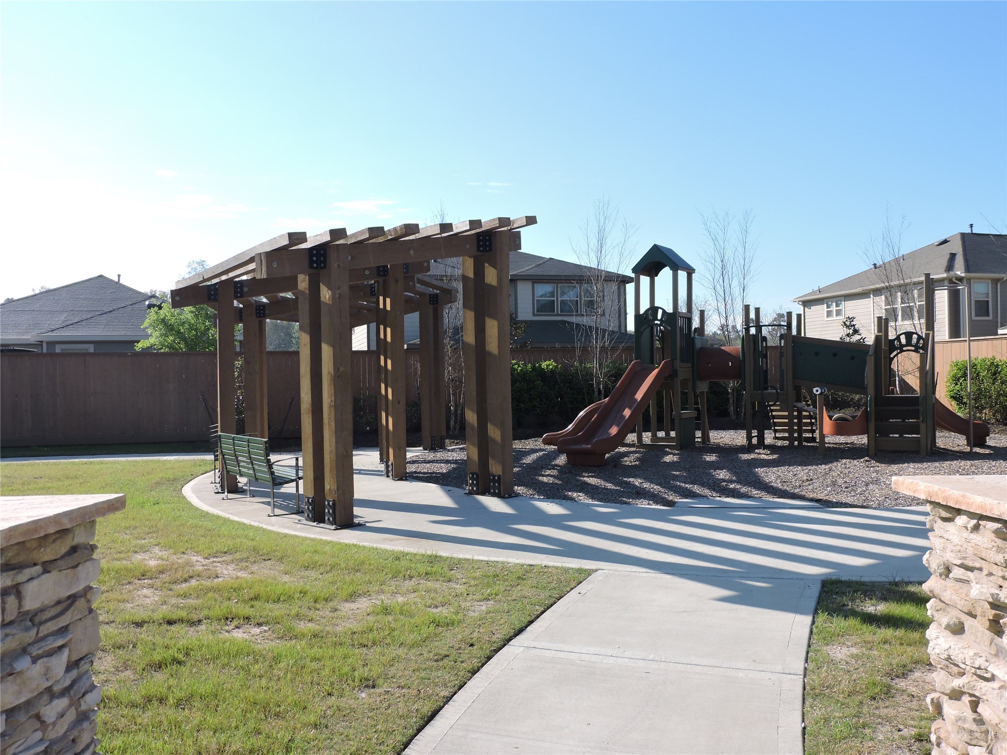 1102 Upton Court Conroe, TX 77304 - Photo 28 of 30 a view of a house with entertaining space