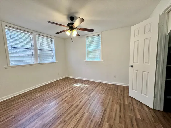 a bathroom with a toilet and a bathtub