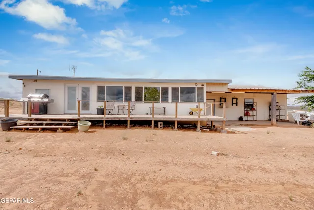a view of a house with a patio