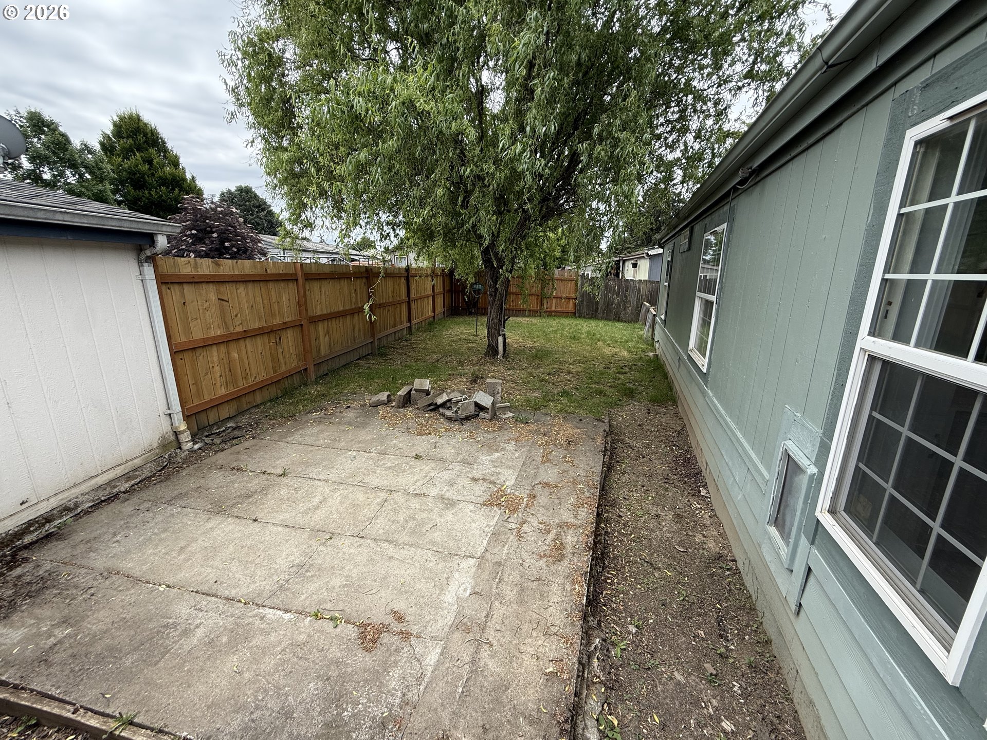 1282 3rd Street, Unit 37 Lafayette, OR 97127 - Photo 24 of 28 a backyard of a house with lots of green space