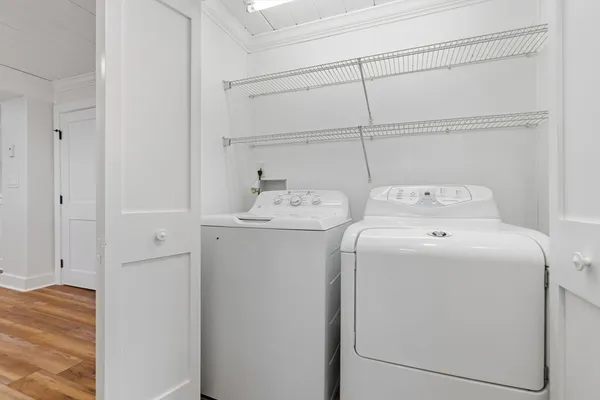 a utility room with dryer and washer