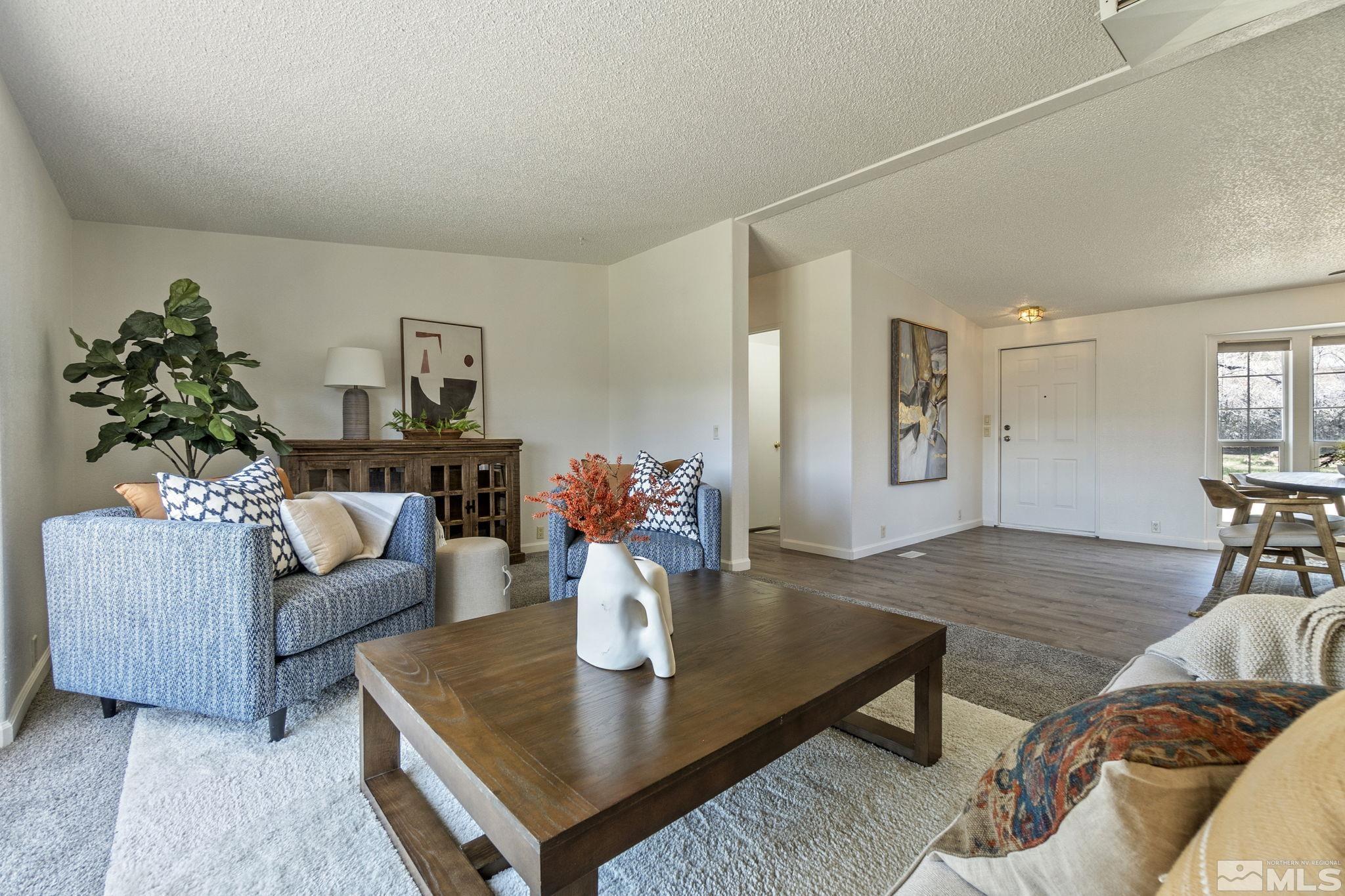 15015 Kivett Lane Reno, NV 89521 - Photo 8 of 37 a living room with furniture and wooden floor