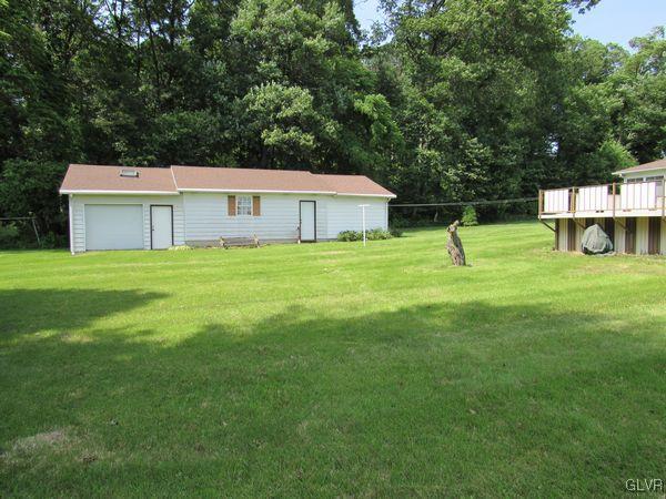 741 South Delps Road Bath, PA 18014 - Photo 11 of 45 a house view with a play ground in front of it