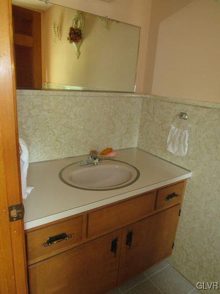 741 South Delps Road Bath, PA 18014 - Photo 17 of 45 a bathroom with a sink and a mirror