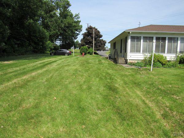 741 South Delps Road Bath, PA 18014 - Photo 41 of 45 a view of a house with a backyard and trees