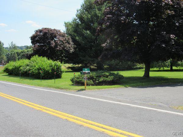 741 South Delps Road Bath, PA 18014 - Photo 5 of 45 a view of road with grass and a trees