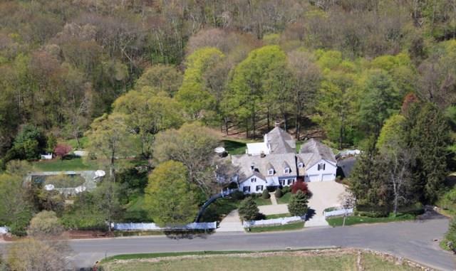 407 Nod Hill Road Wilton, CT 06897 - Photo 1 of 1 an aerial view of residential houses with outdoor space and trees