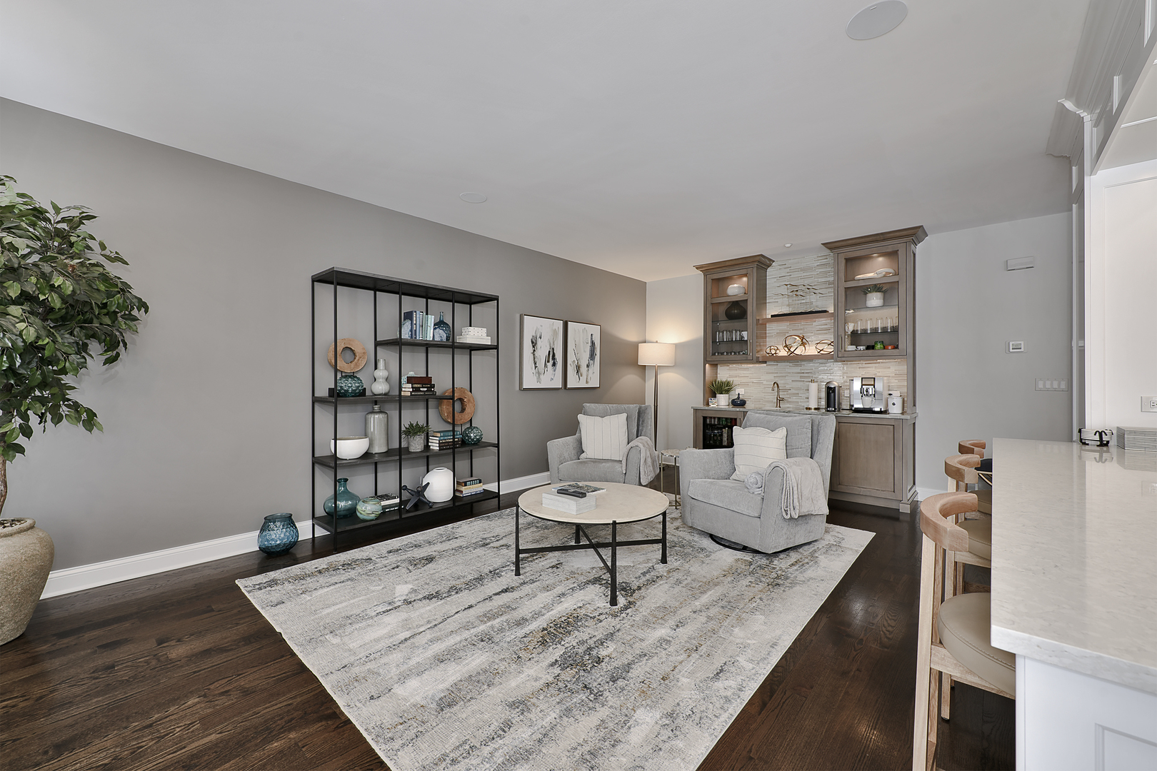 500 Stone Canyon Circle Inverness, IL 60010 - Photo 12 of 33 a living room with furniture and a book shelf
