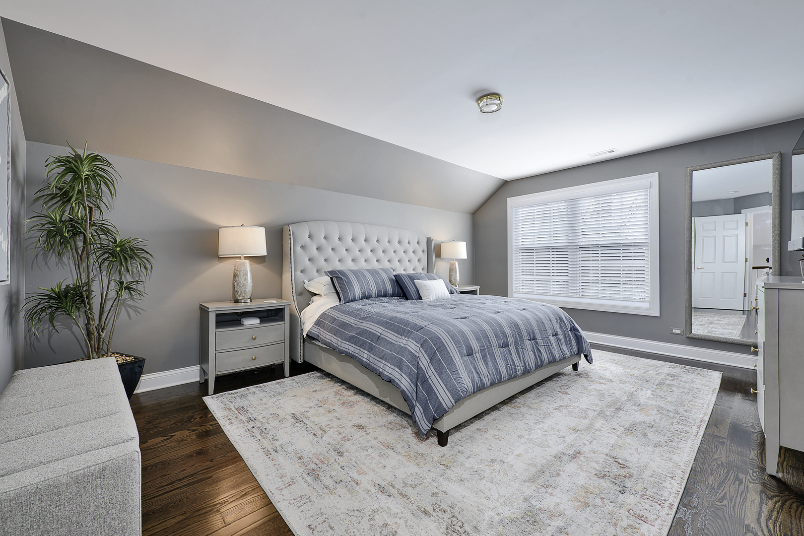 500 Stone Canyon Circle Inverness, IL 60010 - Photo 24 of 33 a bedroom with a large bed and a couch