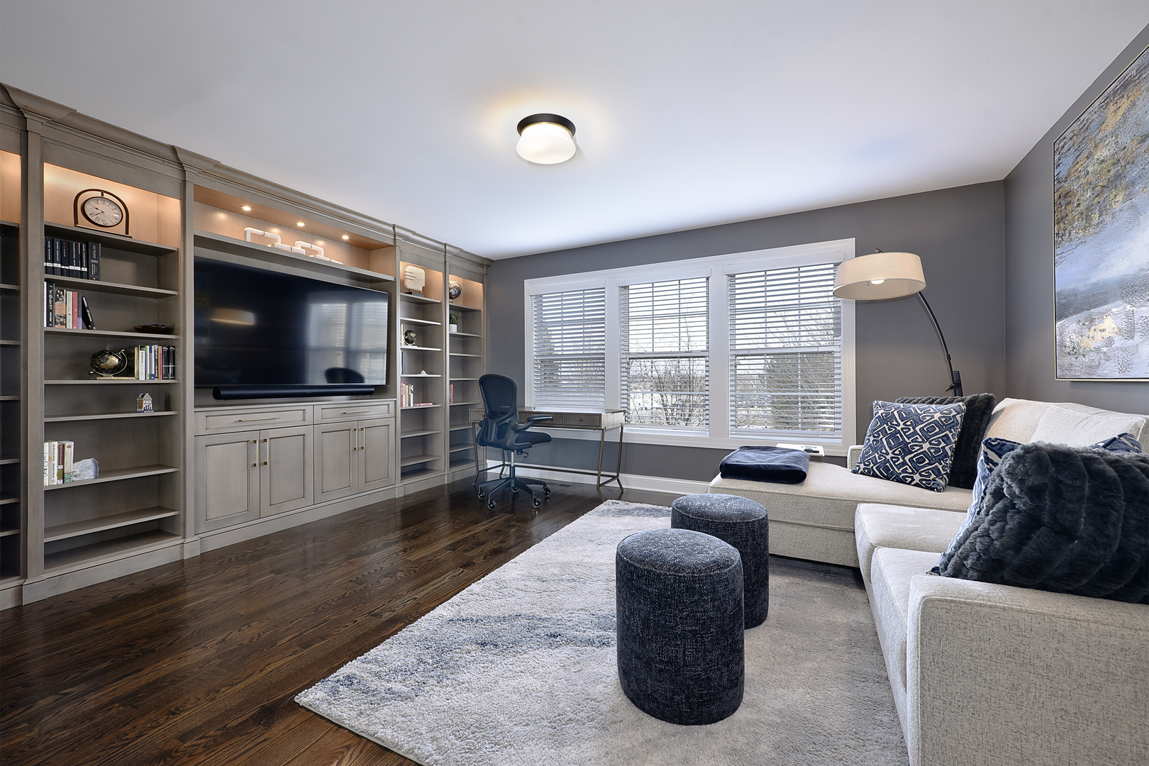 500 Stone Canyon Circle Inverness, IL 60010 - Photo 27 of 33 a living room with furniture and a flat screen tv