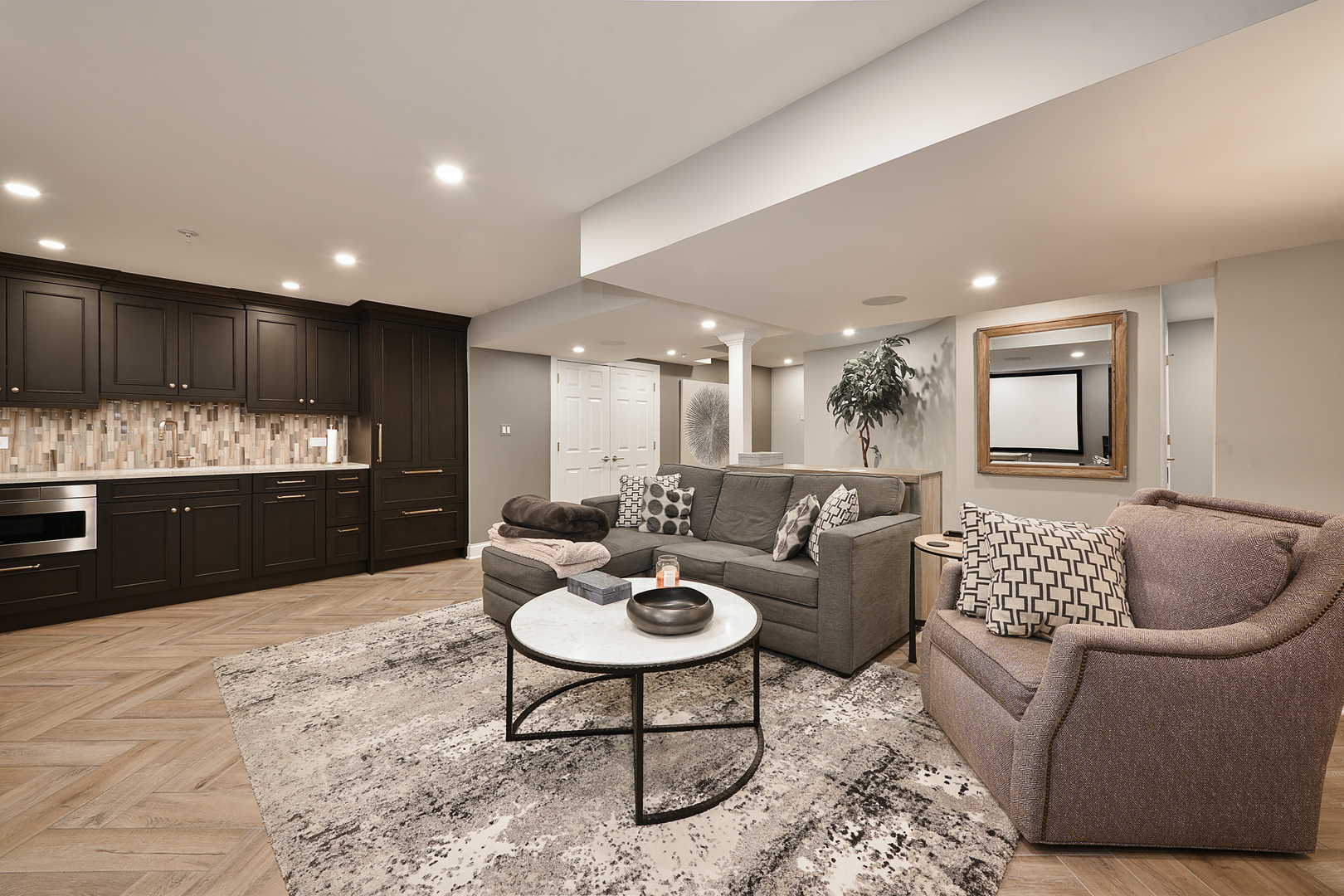 500 Stone Canyon Circle Inverness, IL 60010 - Photo 28 of 33 a living room with furniture kitchen view and a wooden floor